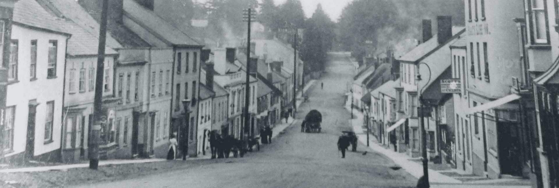 a picture of the Tiverton high street in the old days